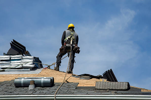 Professional Roof Replacement technician working in Natick, MA